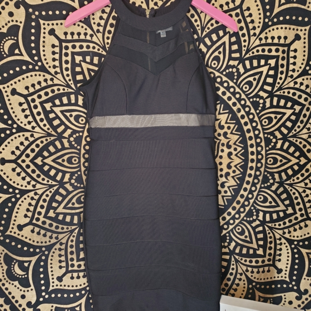Black curve-sculpting cocktail dress